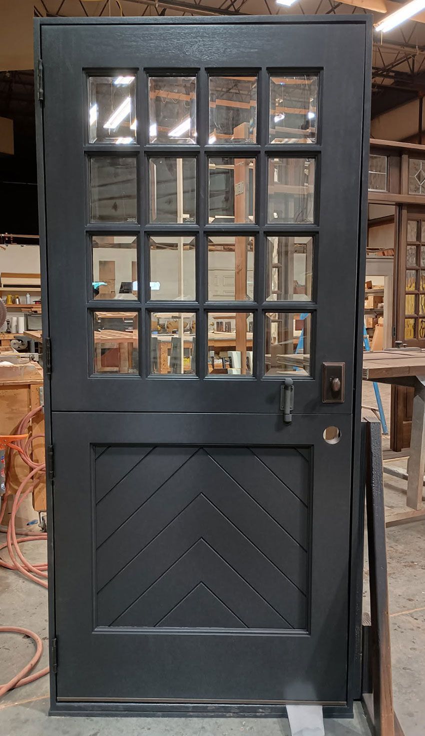 Matthews #28721
Dutch door
Beveled glass & Chevron panel
Painted in SW Black Magic #6991