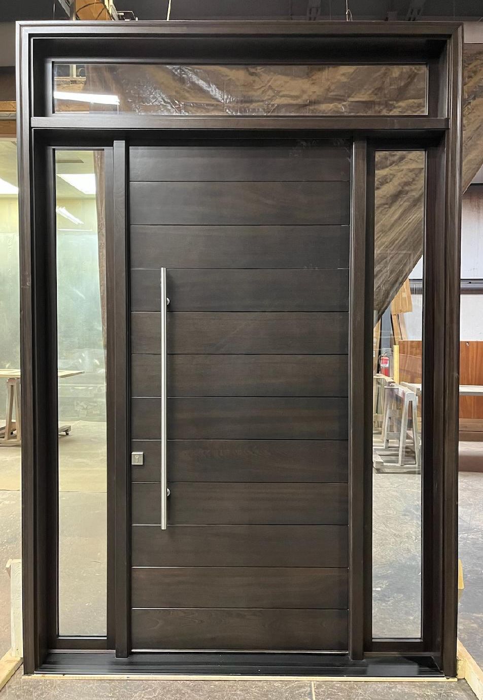 Modern front door made from mahogany with contemporary multipoint lock system