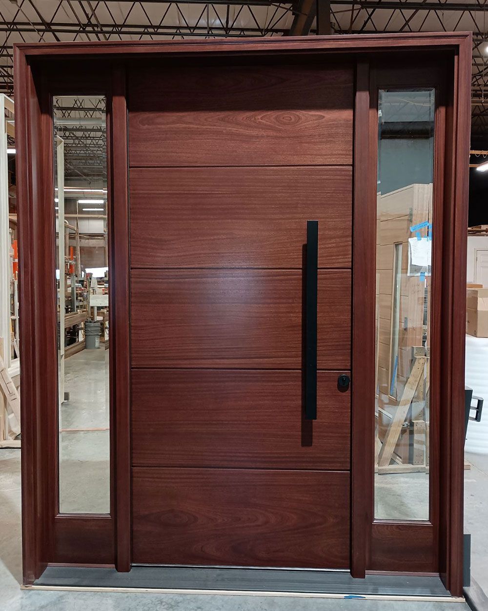SB builders #28638
Mahogany flush door 
Beveled glass
Hoppe contemporary lock system
Custom fabricated pull handles
Finished in Bordeaux
Fairfax Station, VA