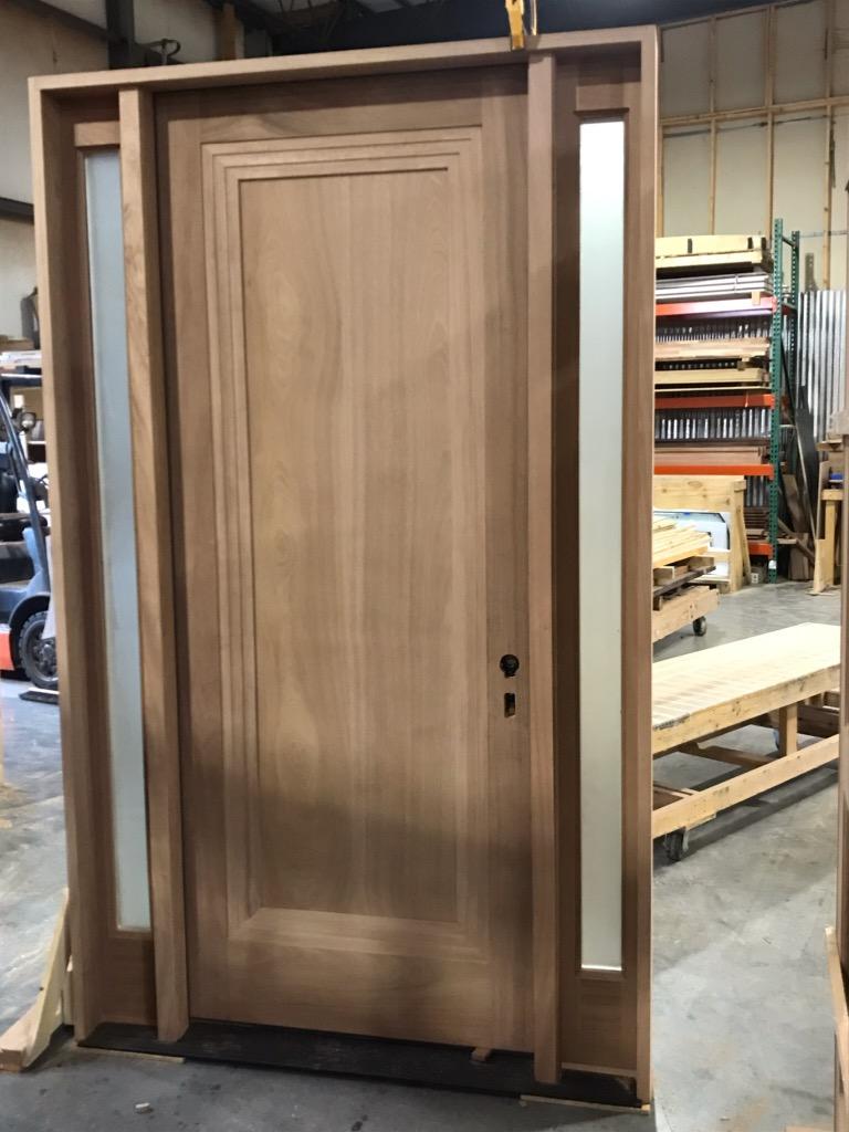 Contemporary solid mahogany door with satin glass sidelights
