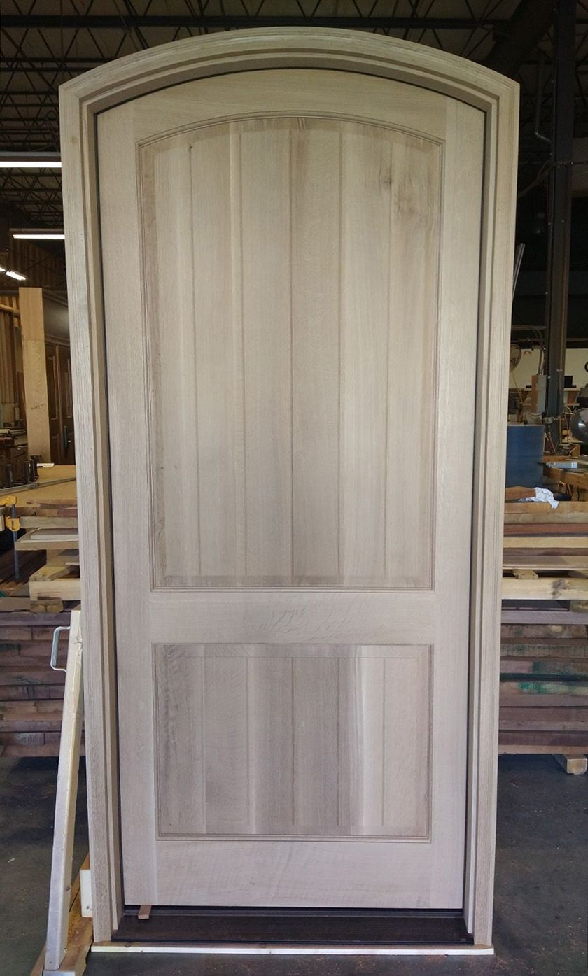 Quarter sawn white oak arched entry door