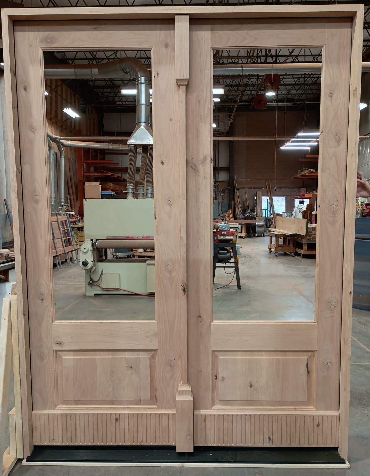 Tlg/Gaylord #29038
Knotty Alder (open for customer to install their glass)
Unfinished
Custom t-astragal & kick plate millwork
Rock Hill, SC