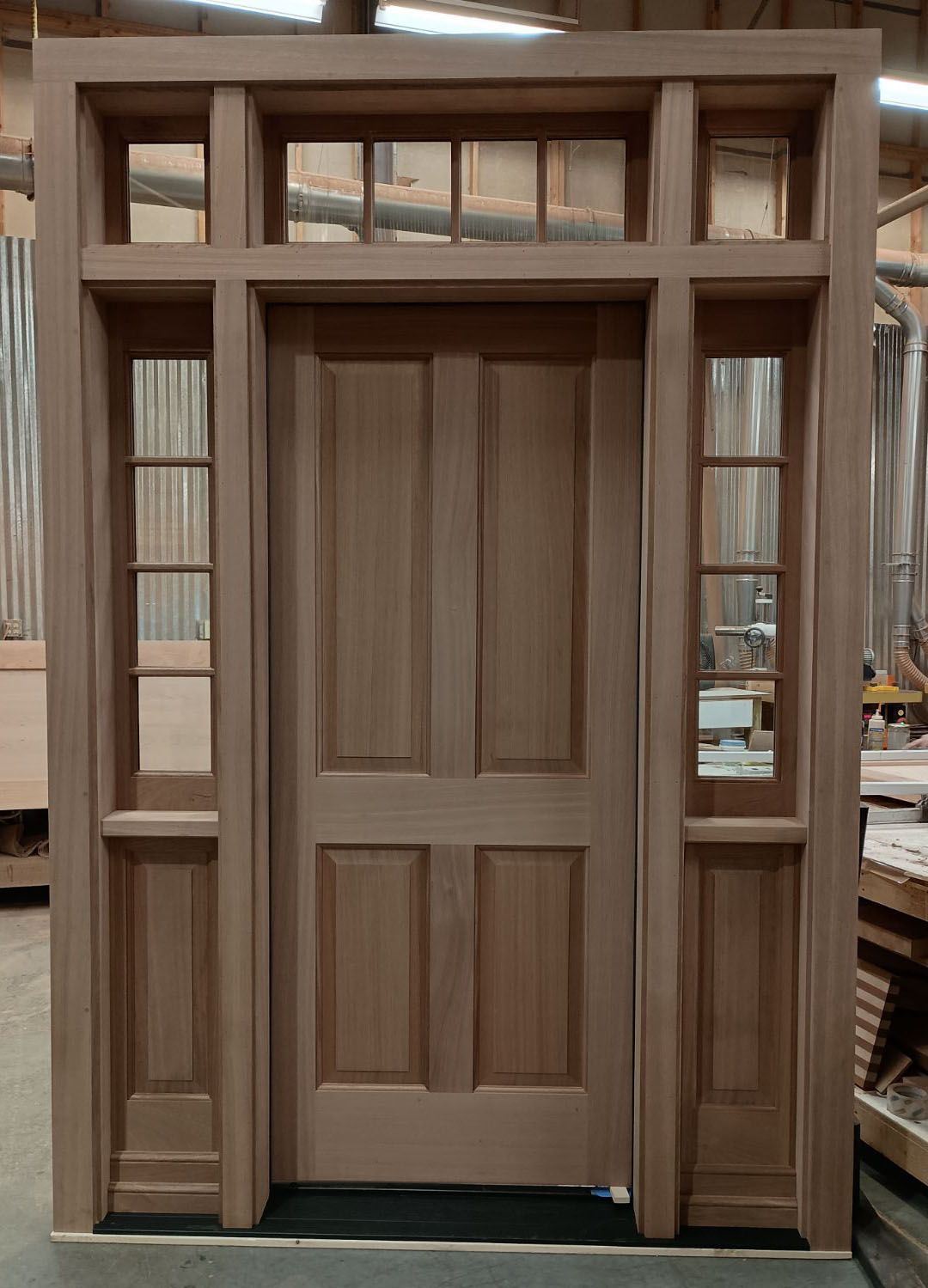 Worobel #28219 Unfinished mahogany 7/8” SDL bars Custom build out on bottom of sidelites with added shelf