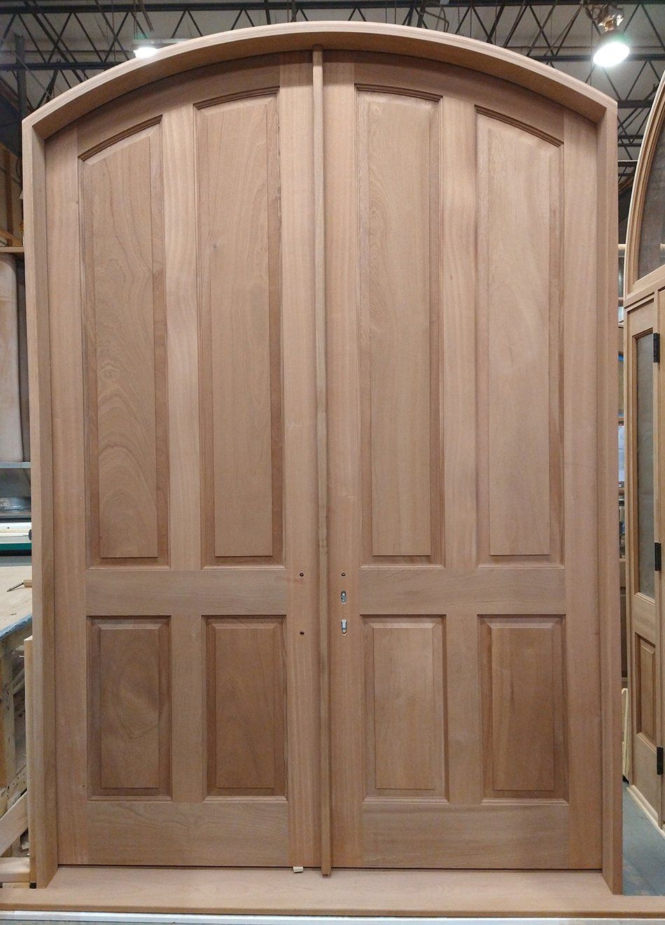 Solid panel Mahogany double 9/0 arched door unfinished