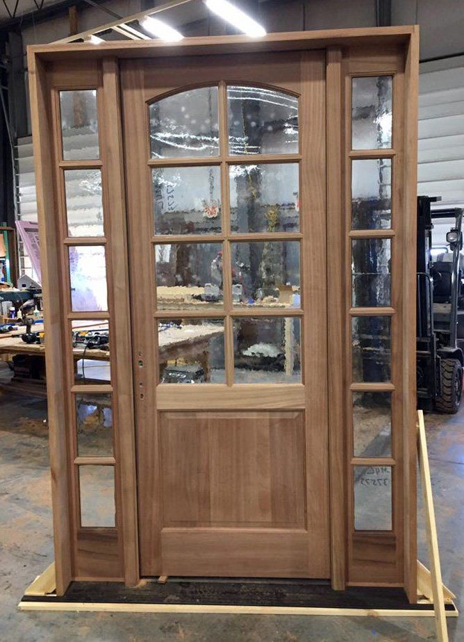 Mahogany door with TDL in upper panel and 5 lite side windows