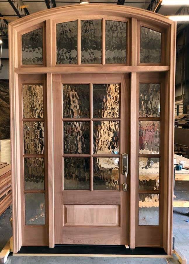 Mahogany door unit with sidelights and arched transom