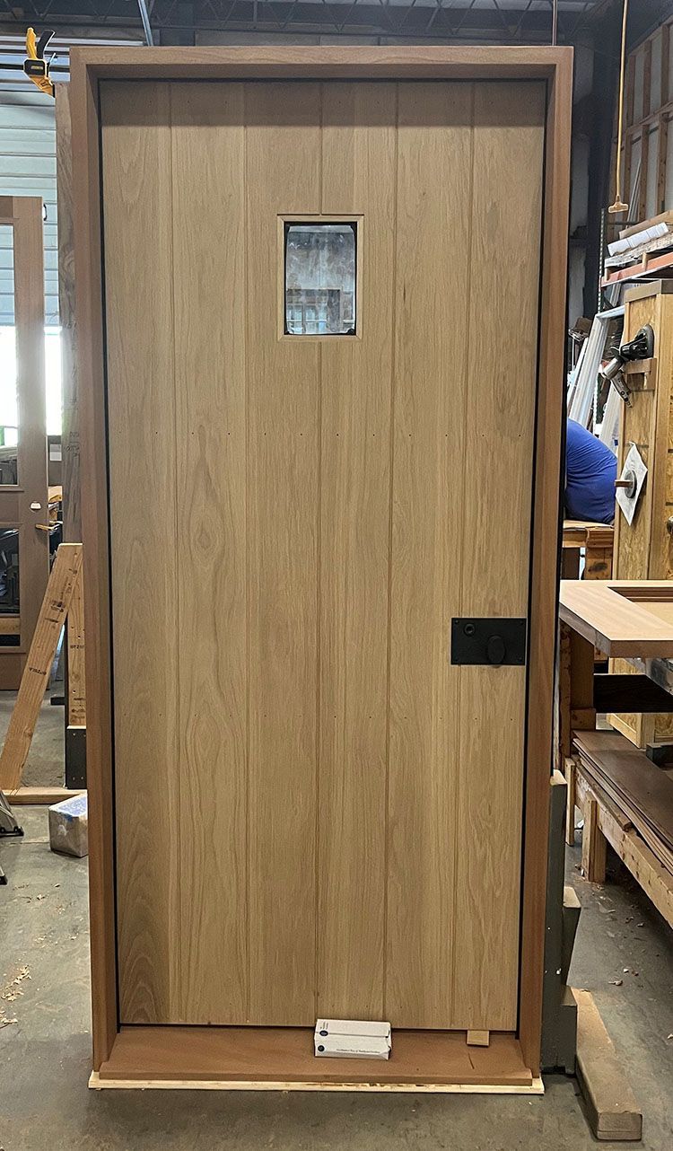 F+H #28455
Flat sawn white oak flush door with v-grooves
Fixed window
Batten boards