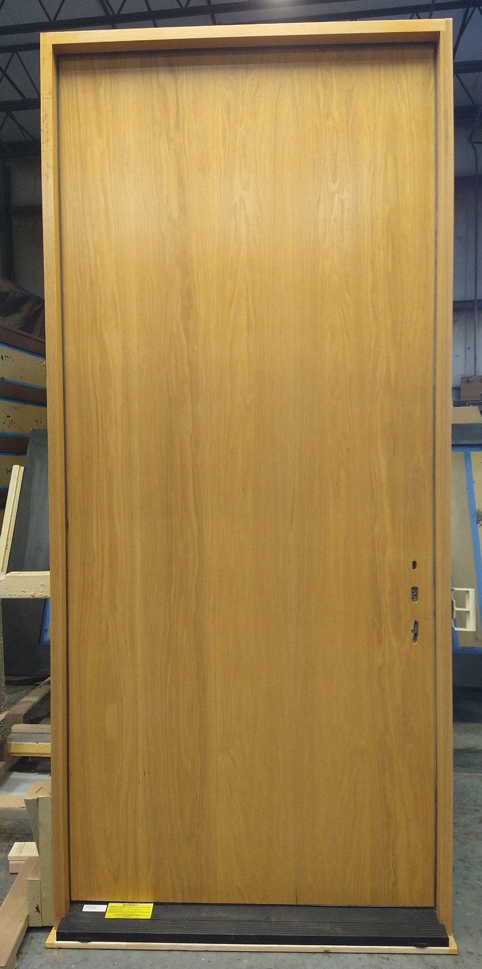Haddon #26603  Red oak flush door  Finished in honey clear coat