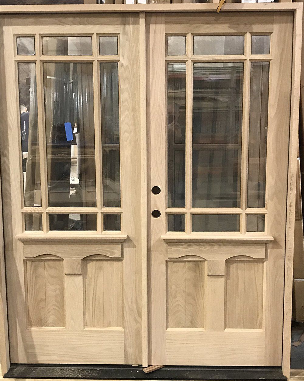 Unique half lite double door unit with dentil shelf
