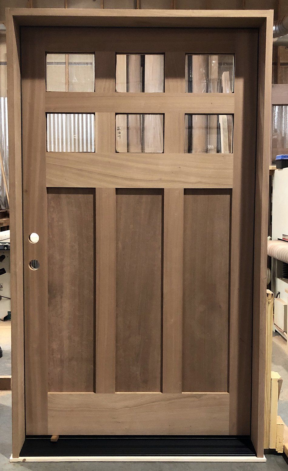 Mahogany exterior craftsman style door shown unfinished