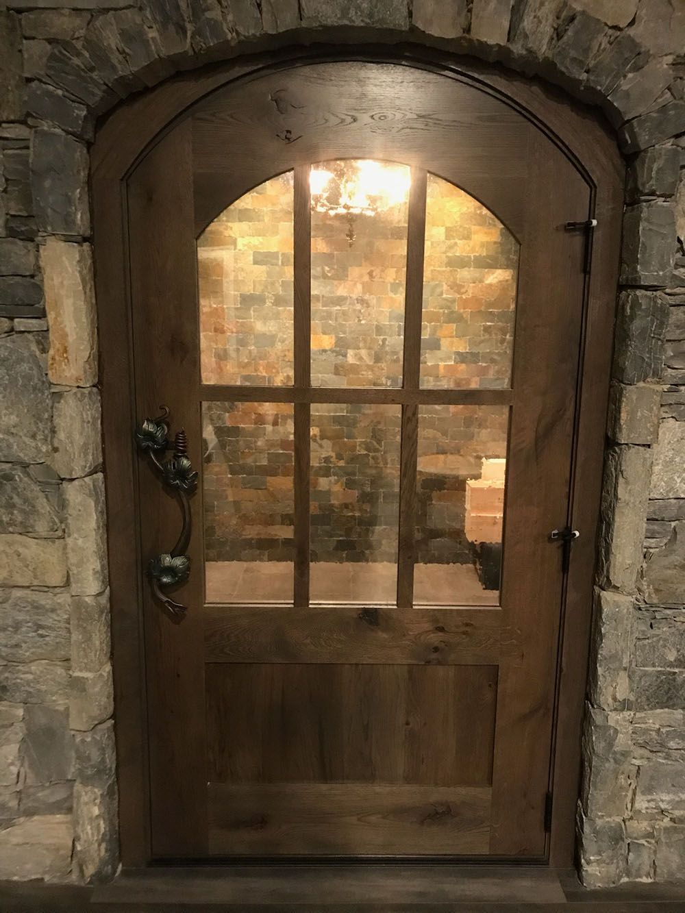 a custom wood wine cellar door