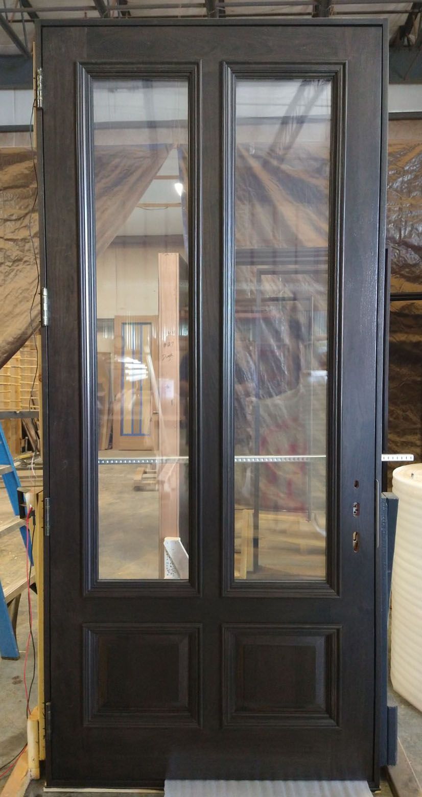 Walnut door with applied molding and electronic switchable glass