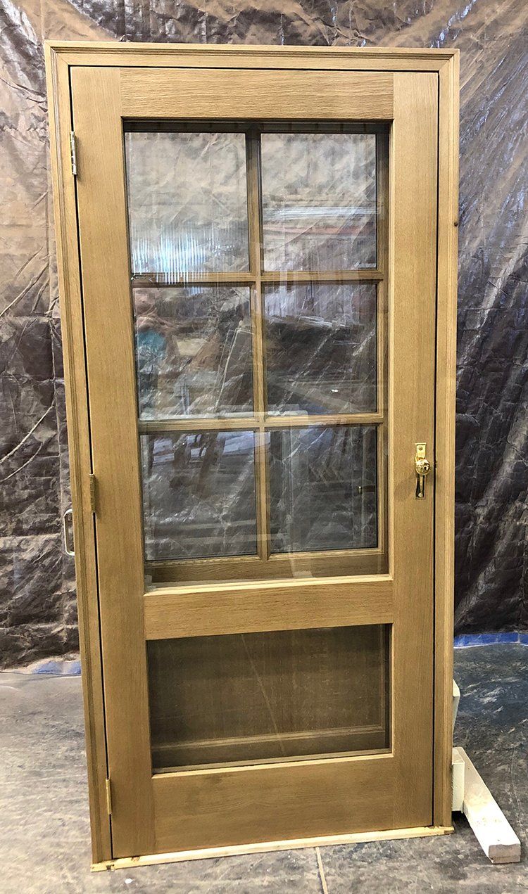 Traditional 6 lite  Rift Sawn White Oak wood door with storm door