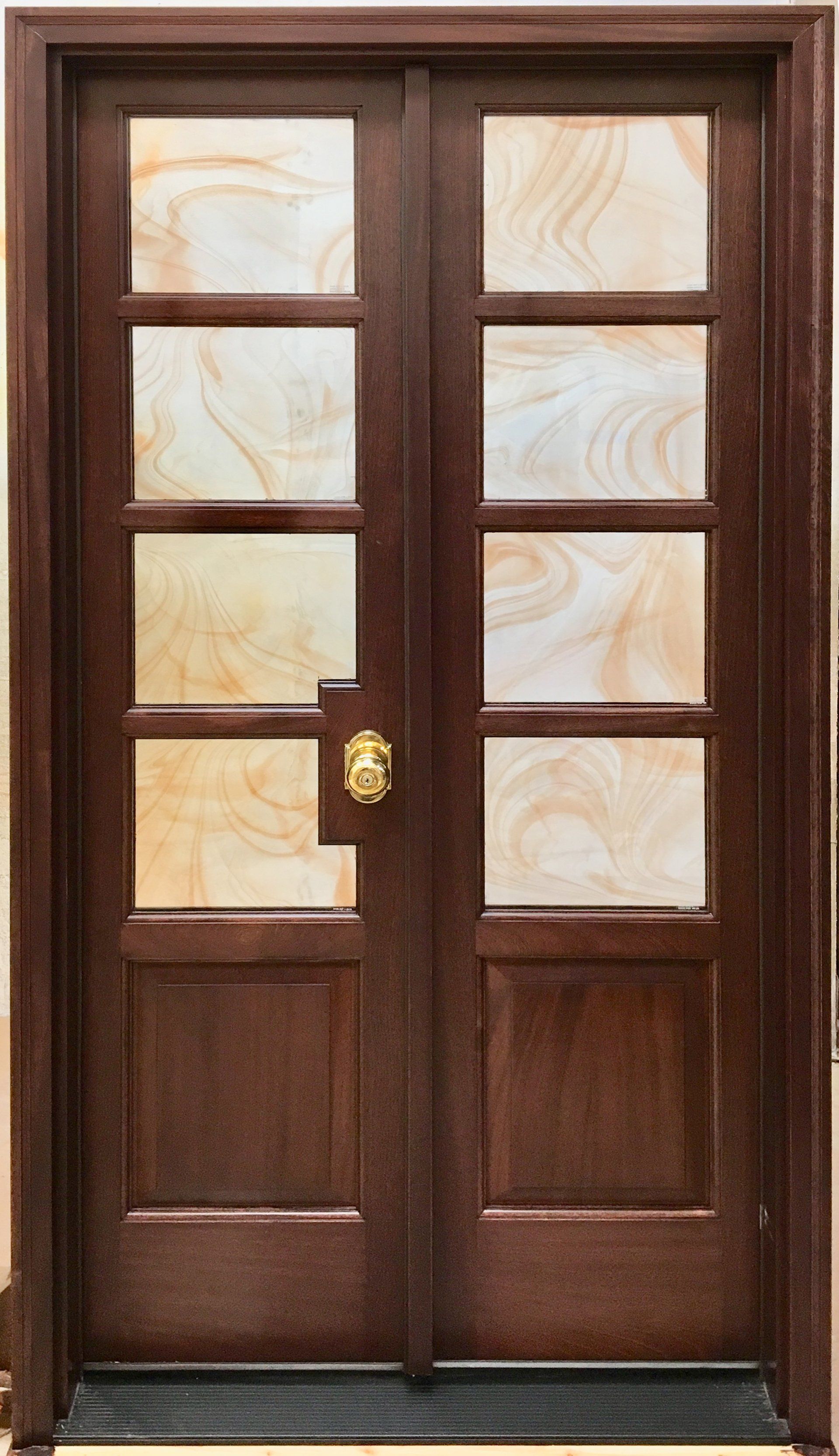 Custom French doors with cinnamon baroque glass.