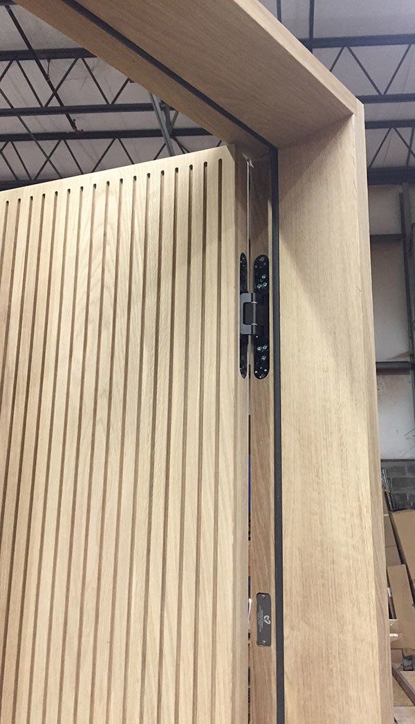 A close up of a wooden door in a building.