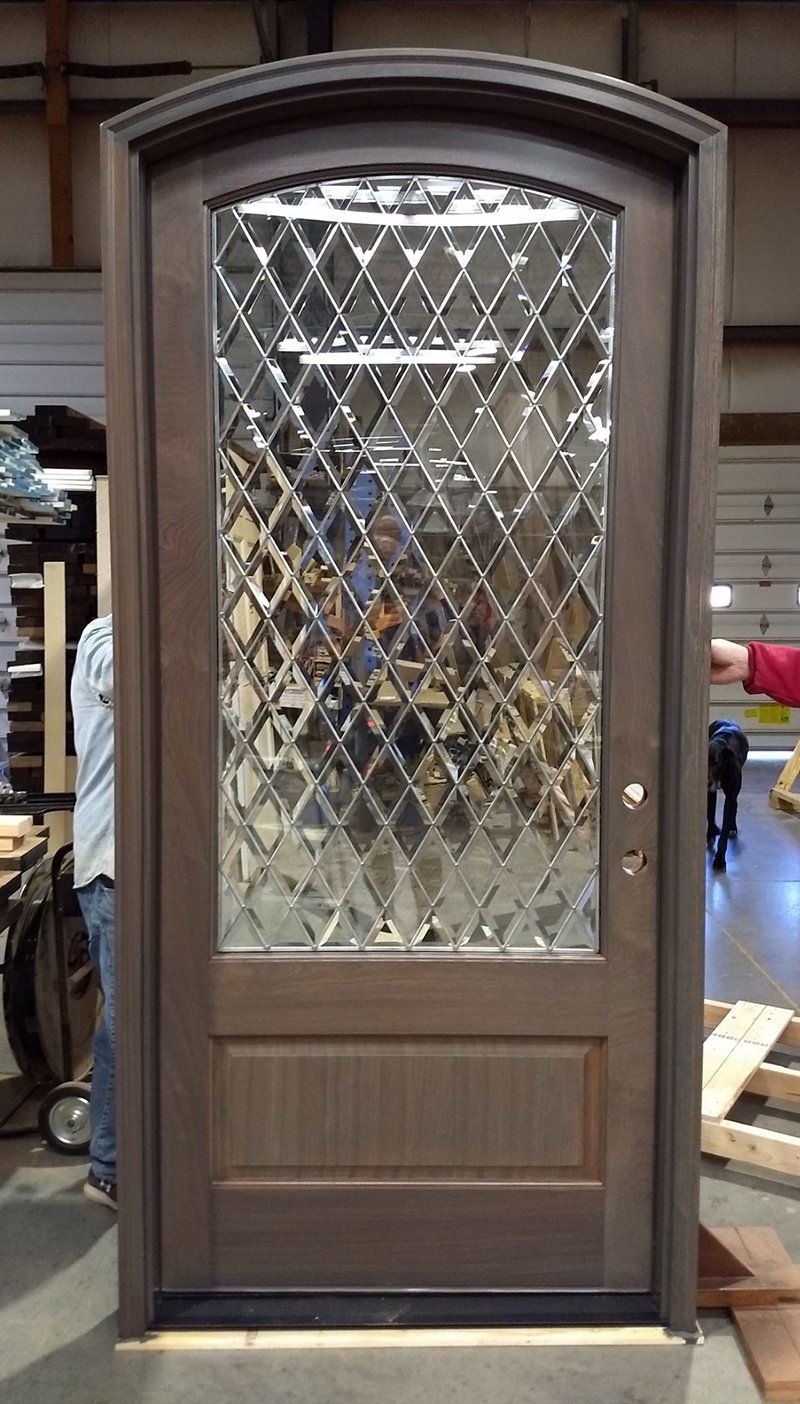 Mahogany wood entry door with diamond bevel glass