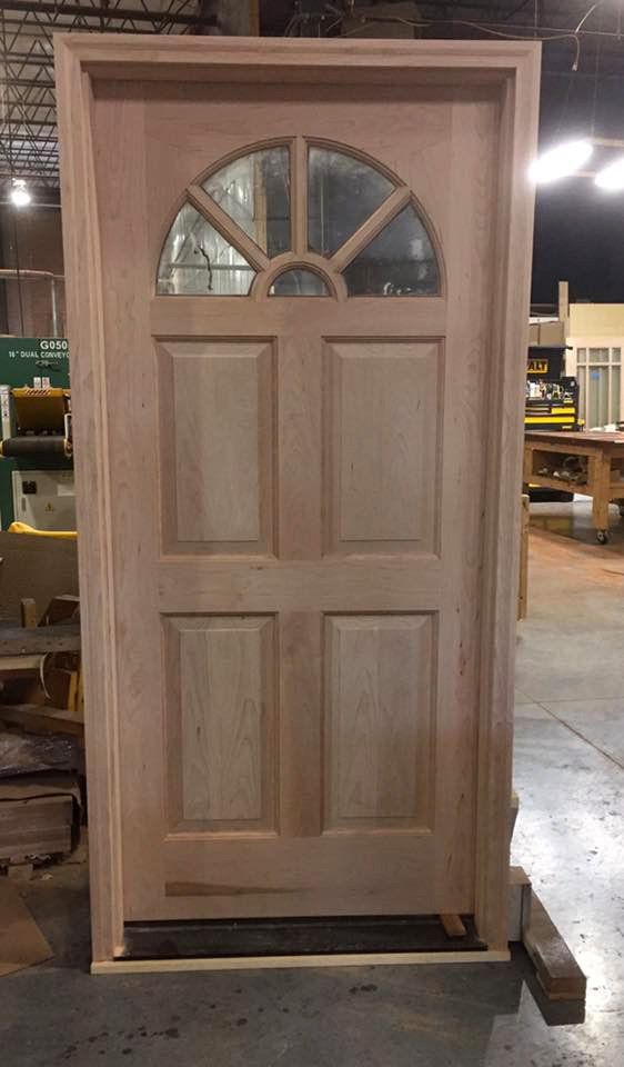 4 panel wood door with half circle of glass on top