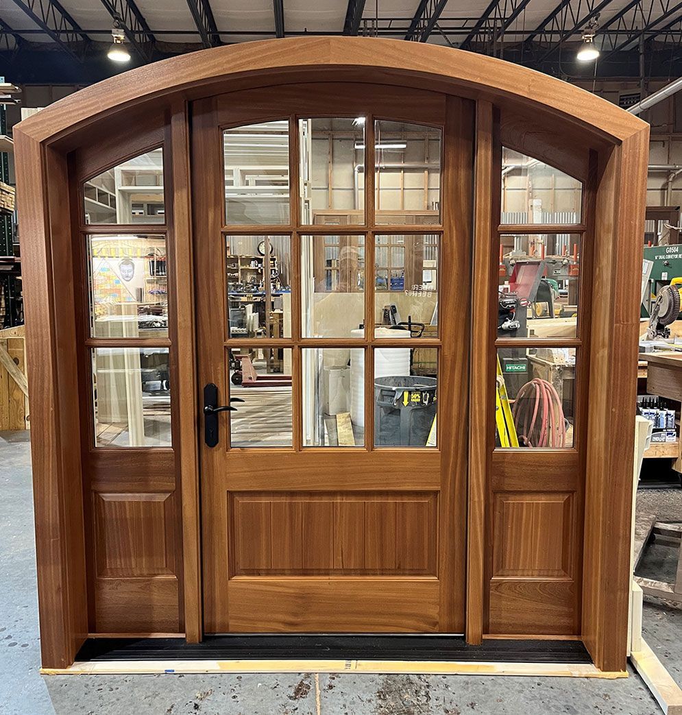 Thompson Timber #28820
Mahogany door 
Finished in Honey
Lyndonville, VT