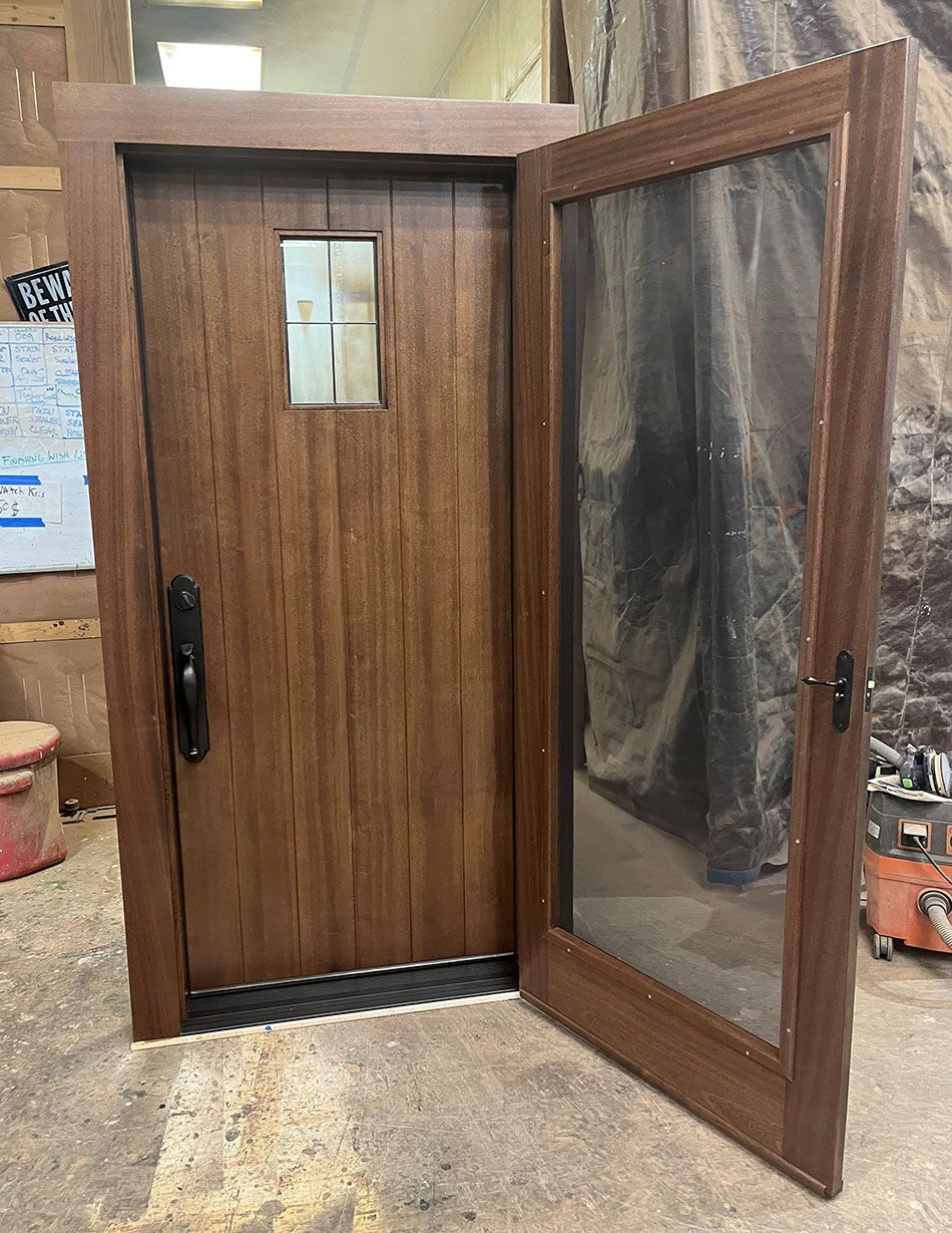 Ward #28354 
Mahogany door & screen door 
Finished in 50/50 blend Minwax Dark Walnut & English Chestnut