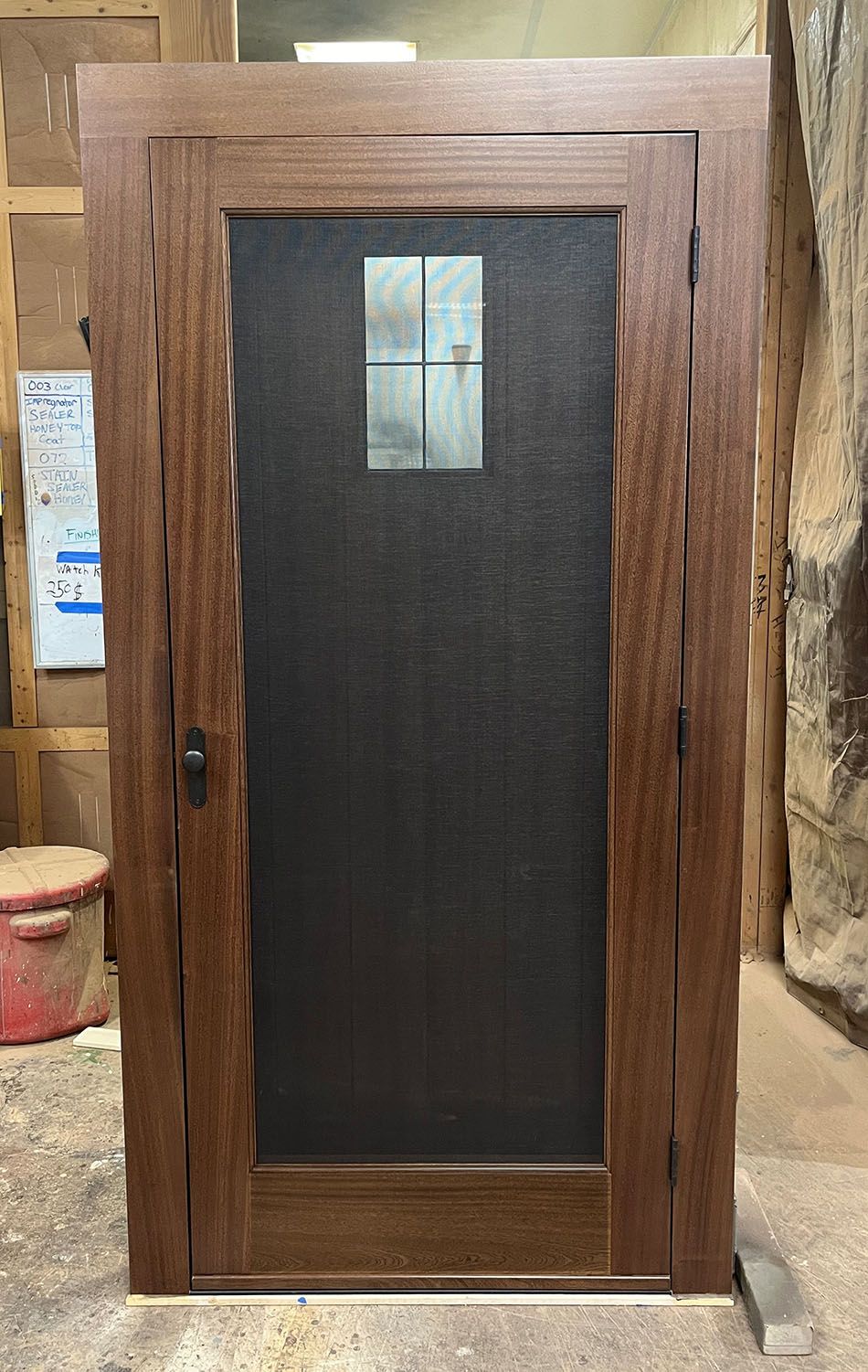 Ward #28354 
Mahogany door & screen door 
Finished in 50/50 blend Minwax Dark Walnut & English Chestnut