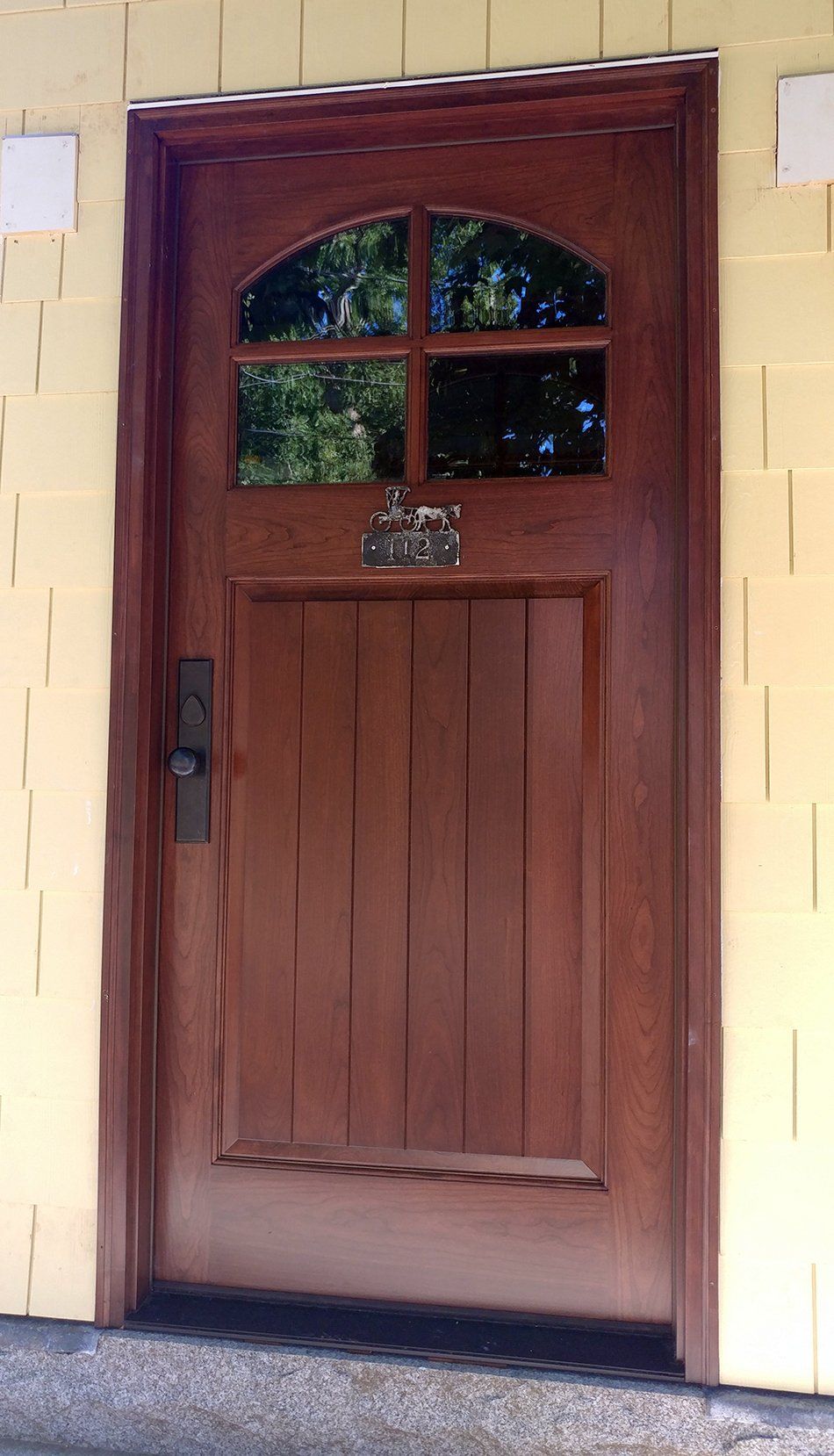 Cherry wood door with v-grooves and 4 glass windows