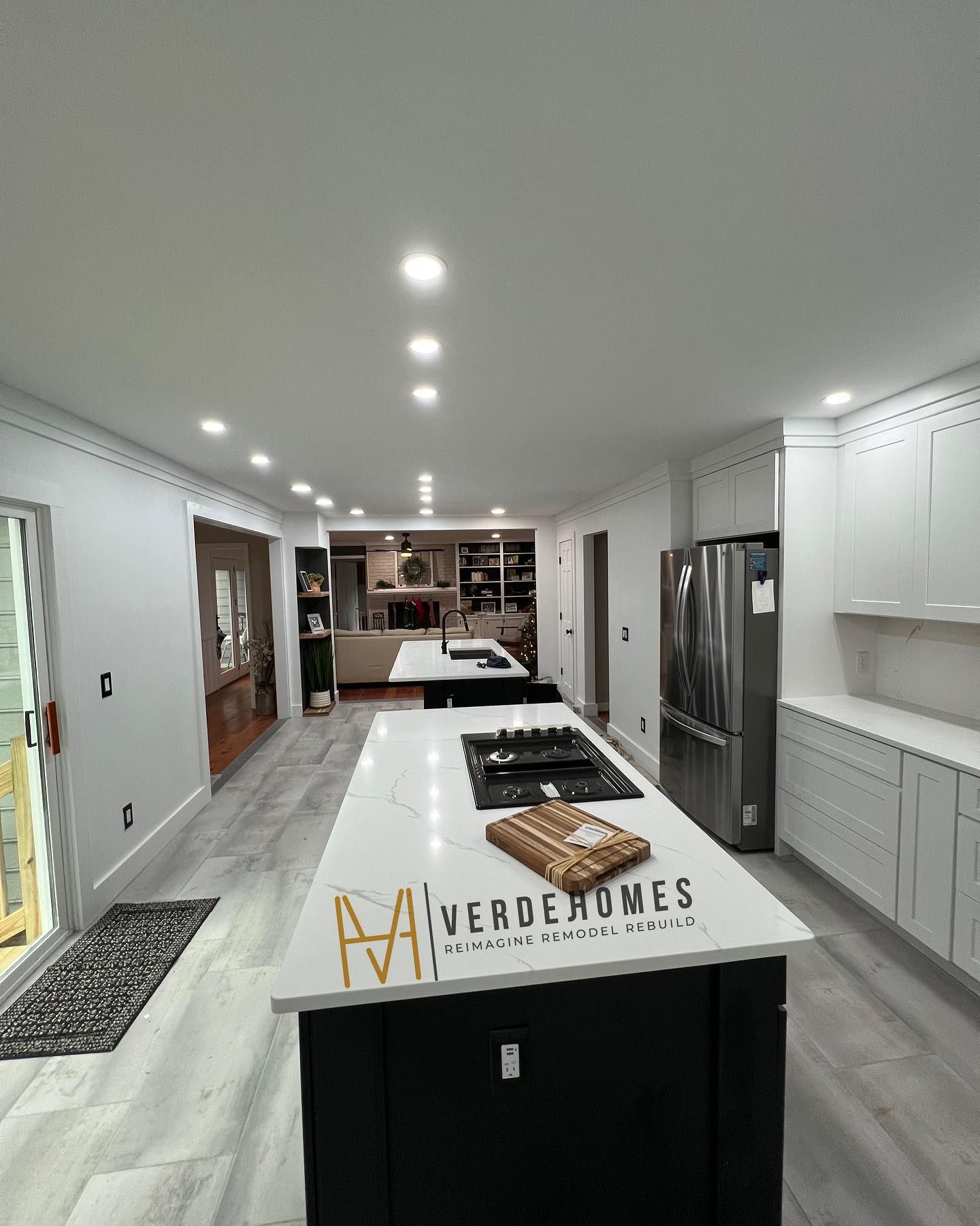 A kitchen with a large island in the middle of it