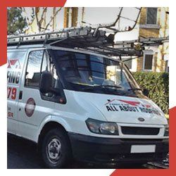 white coloured van carrying ladder