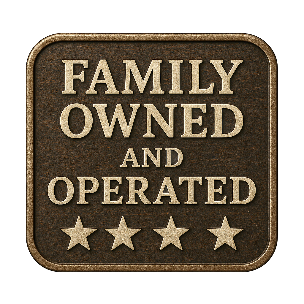 A bronze-colored square plaque with the text 