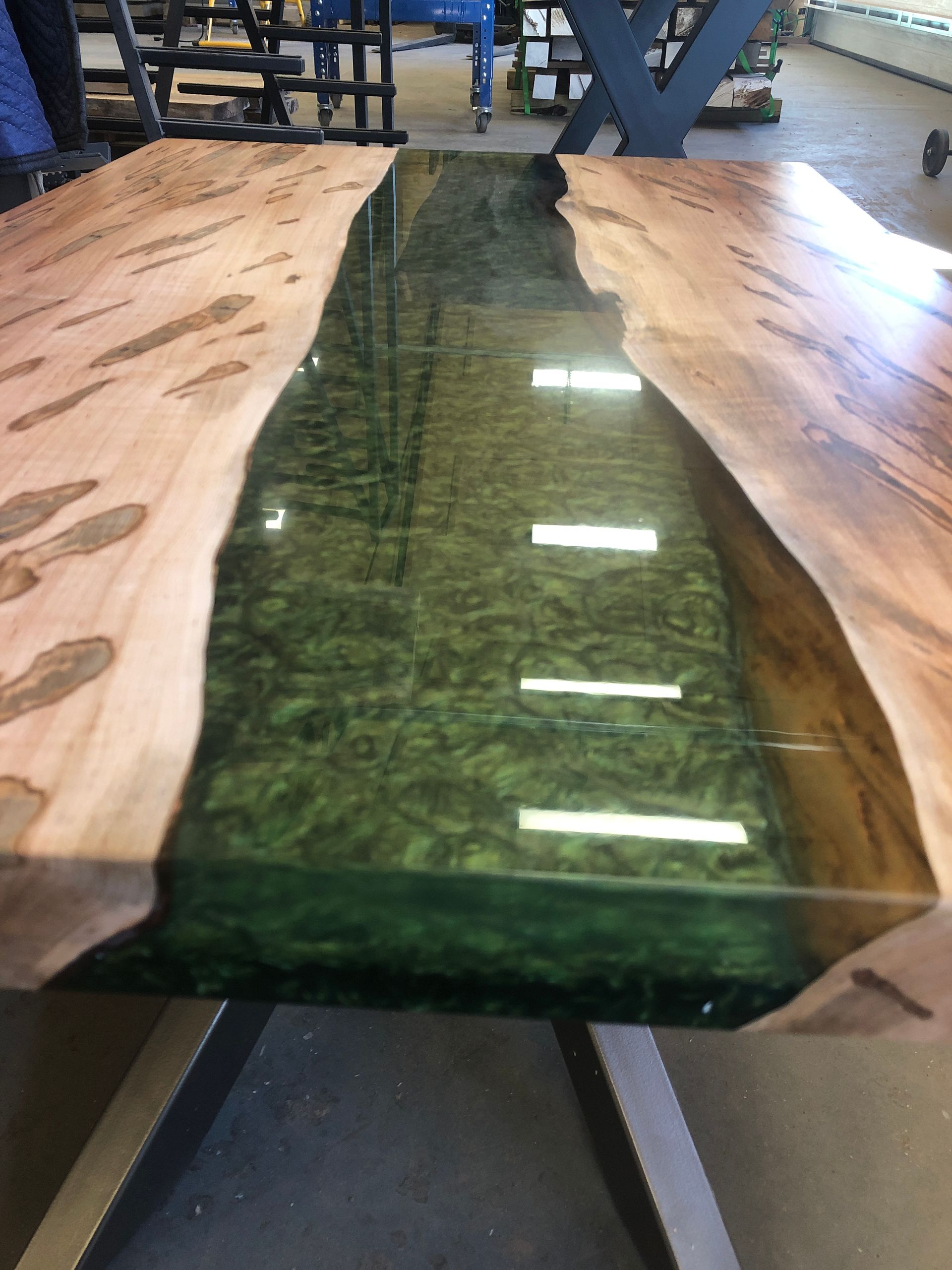 A wooden table with a map of the united states on it.