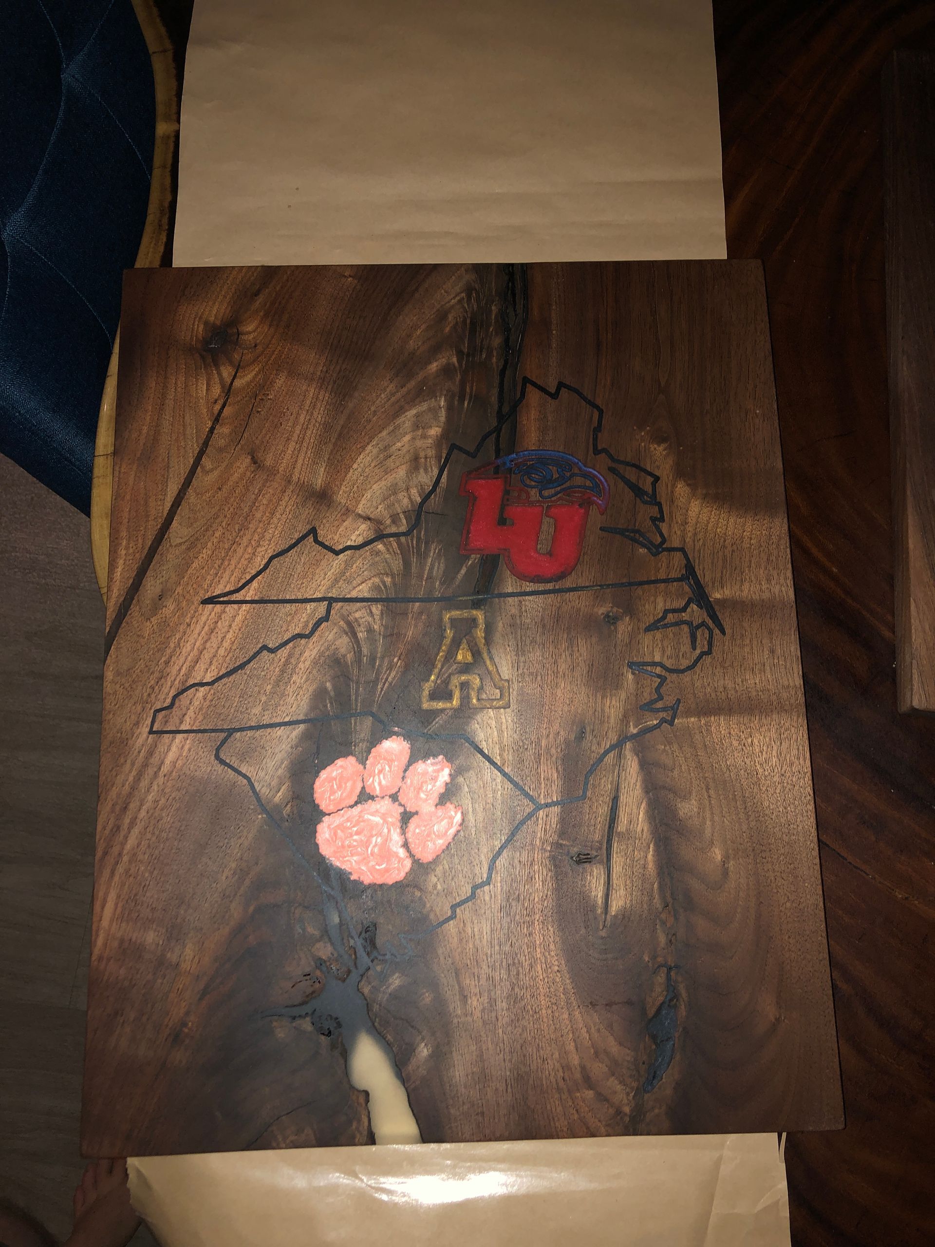 A wooden table with a map of the united states on it.