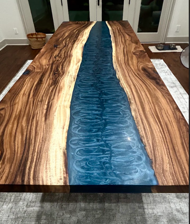 Wood and blue epoxy river table.