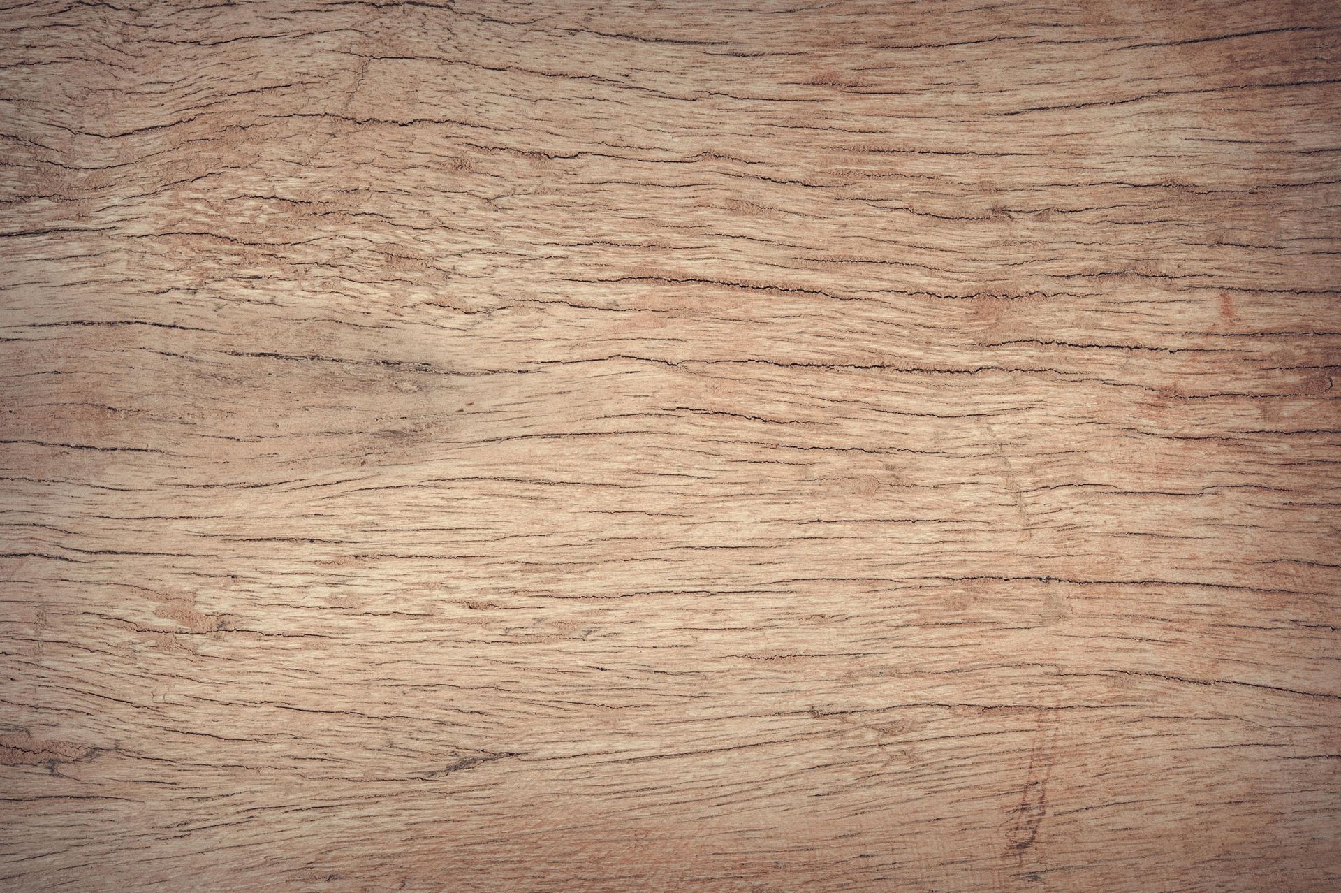 A close up of a wooden surface with a grainy texture.