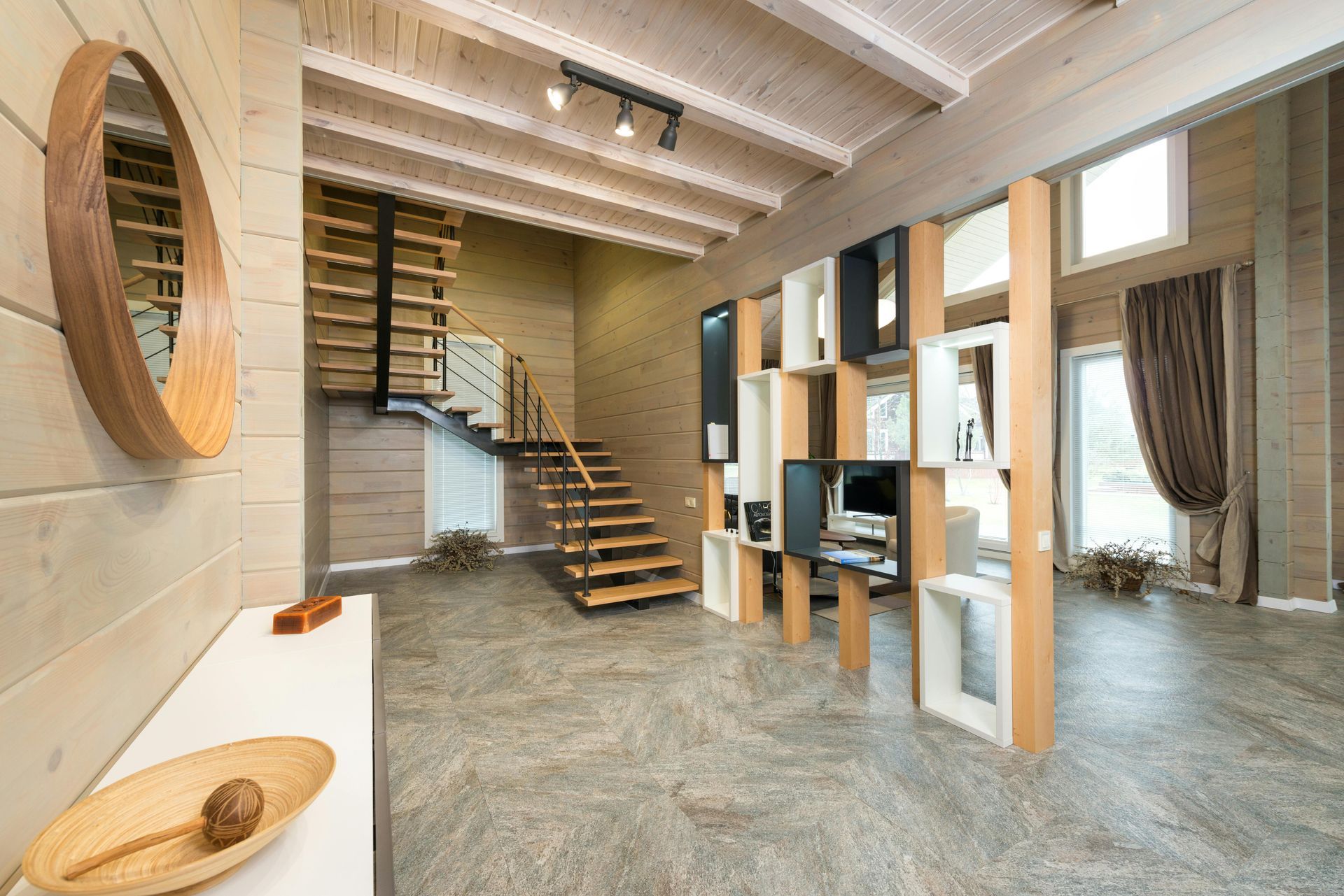 There is a staircase in the middle of the room.