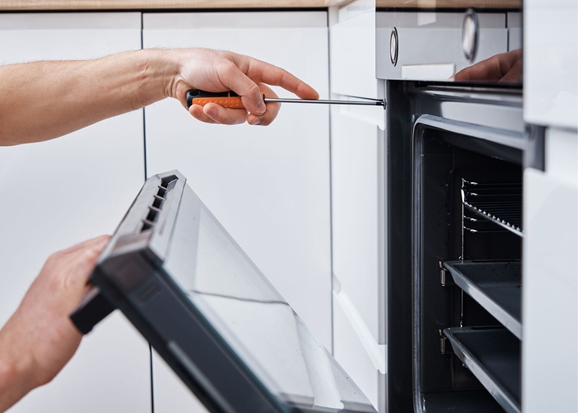 Handyman Vancouver Contractor installing repairing a oven appliance