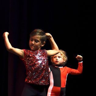 Girl Dancing On Stage — Dance Classes In Townsville