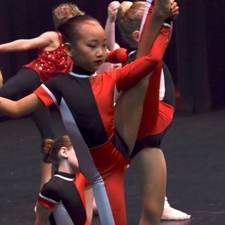 Acrobat Doing a Split — Dance Classes In Townsville