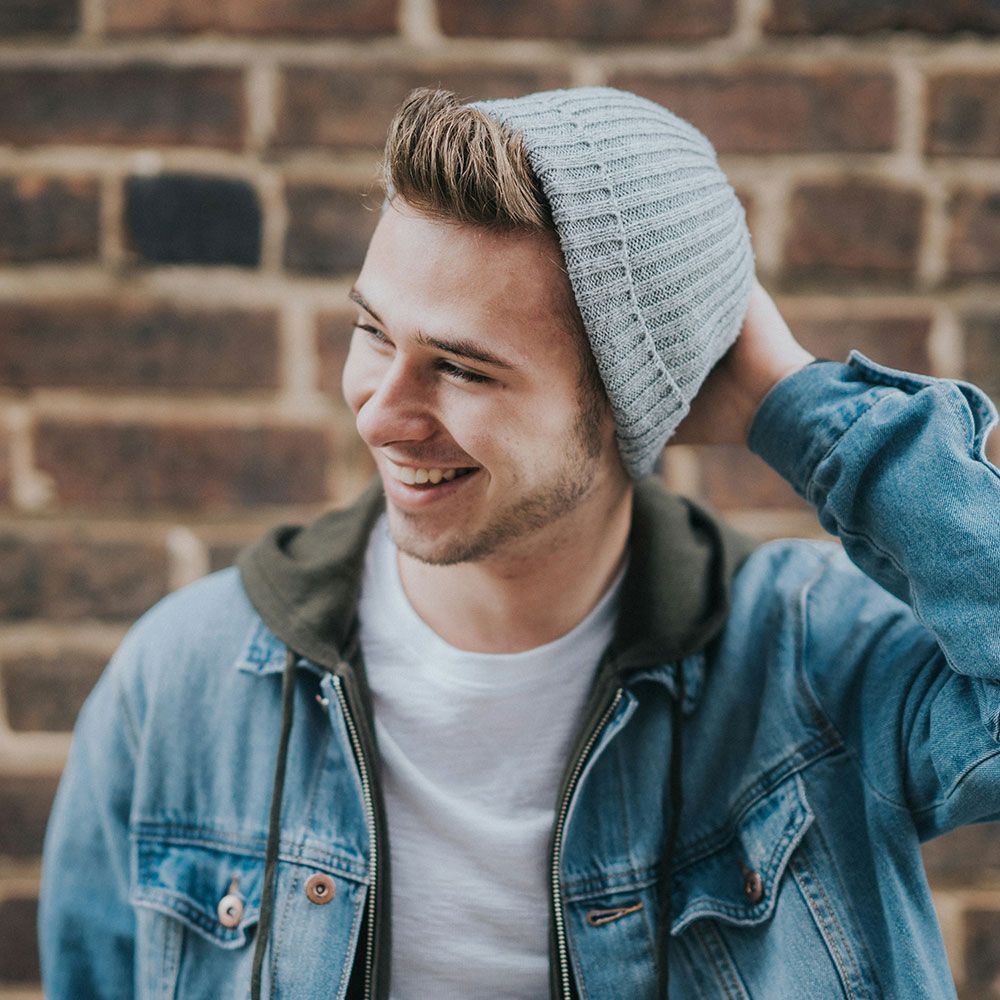 smiling teen with beanie