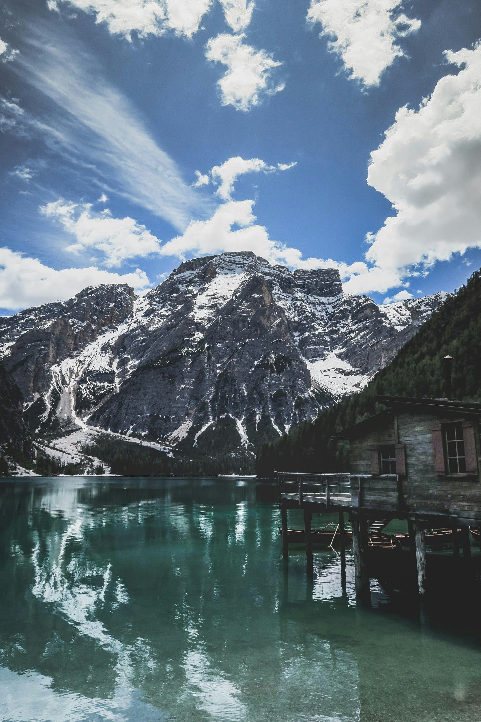 Mountains with snow and a blue lake