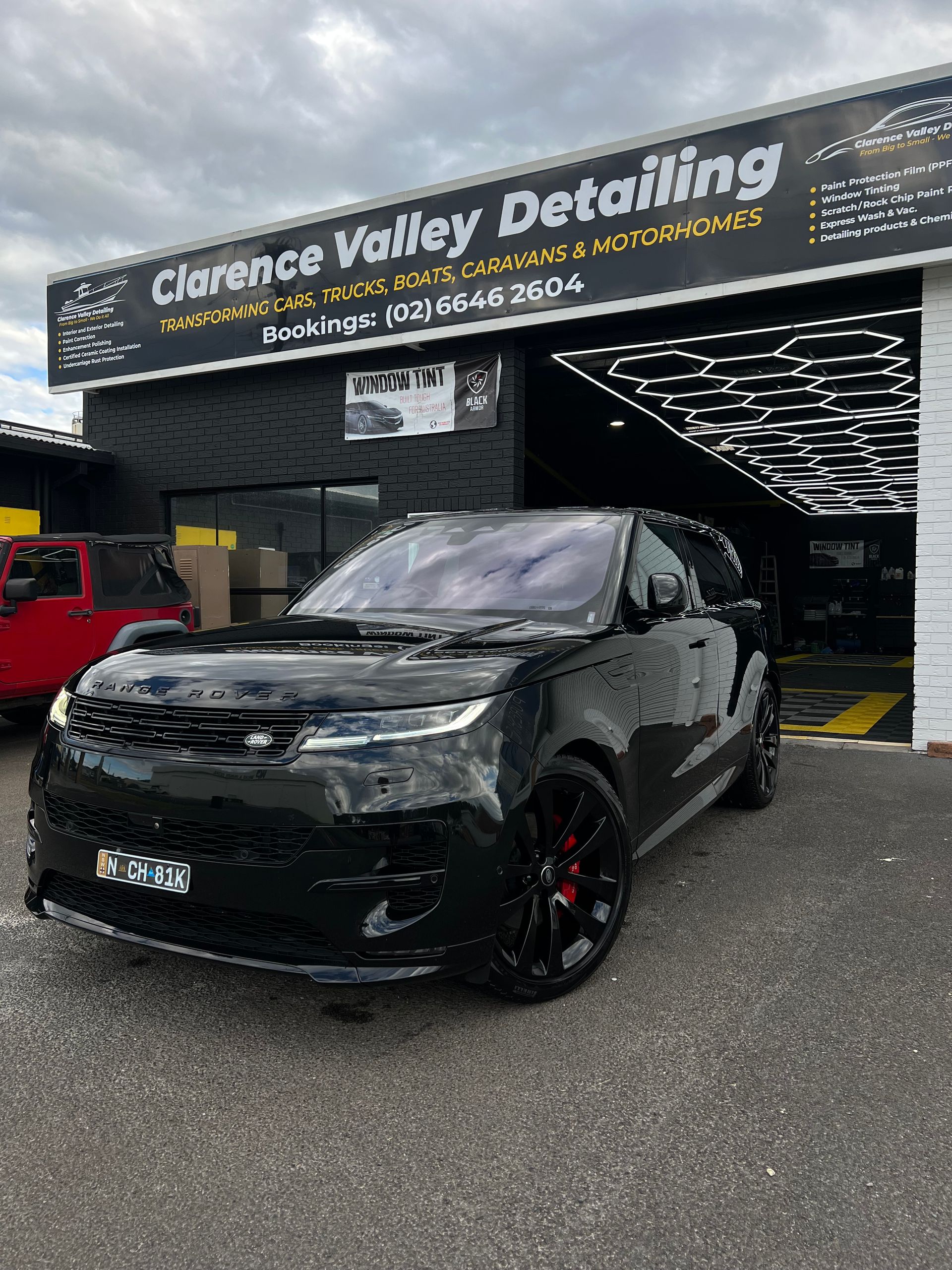 A Black Range Rover is Parked in Front of Clarence Valley Detailing — Clarence Valley Detailing In Yamba, NSW