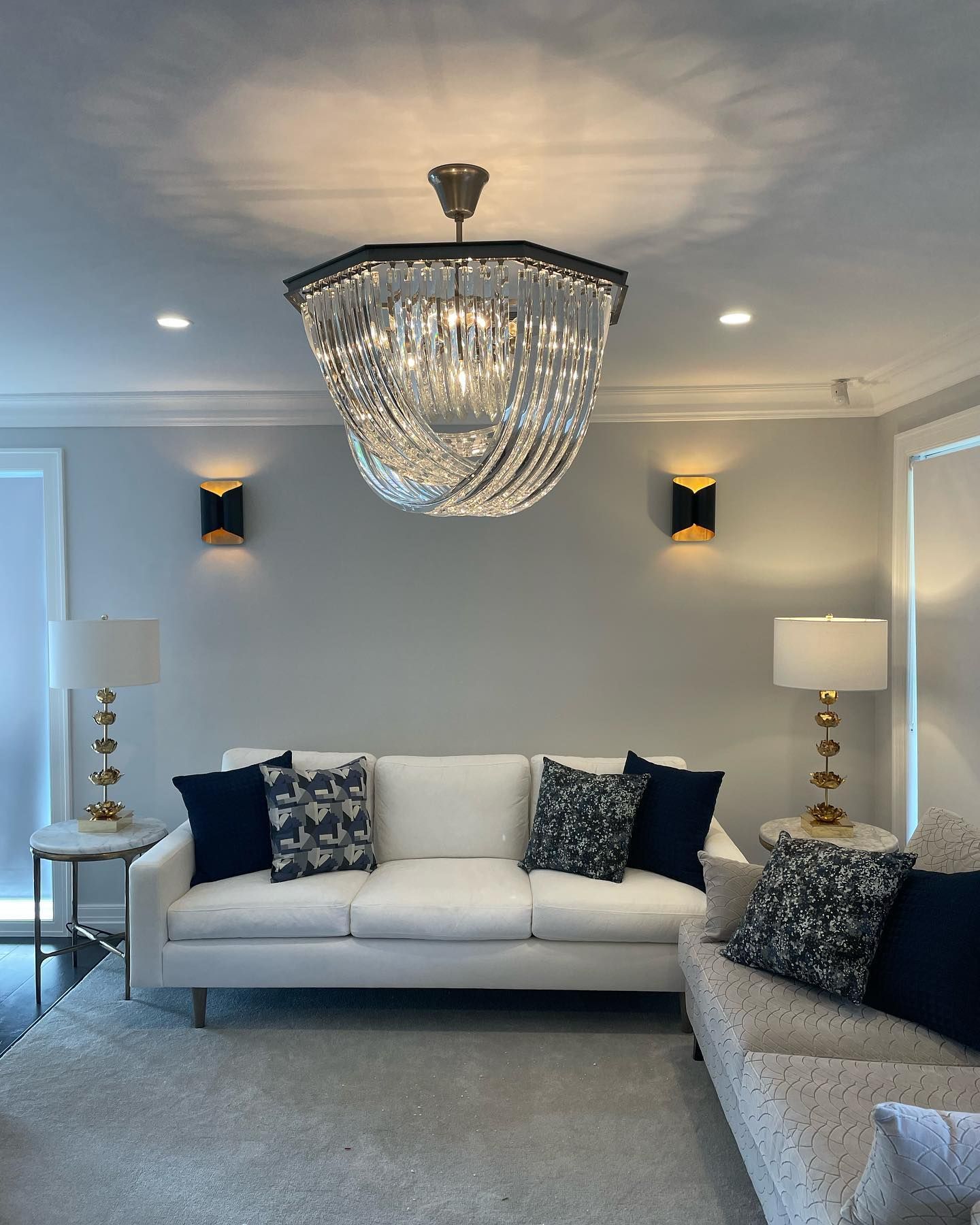 A Person Wearing Gloves Is Working On An Electrical Outlet — Luke Jones Electrical In Bellambi, NSW