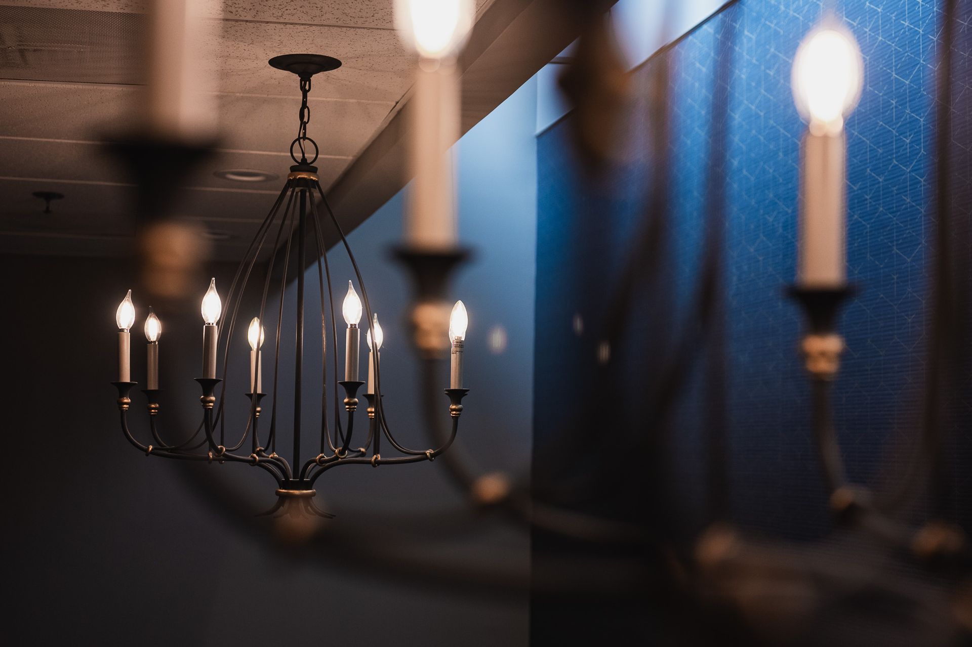close up of candle chandeliers