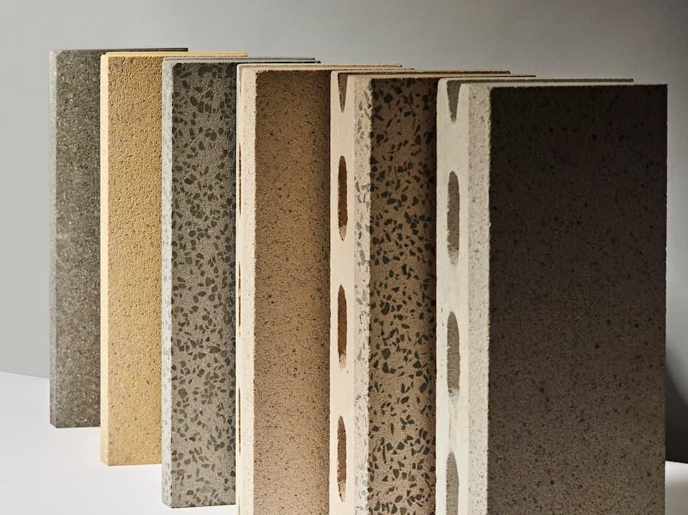 A Row Of Different Colored Tiles Are Stacked On Top Of Each Other — Southern Bricks & Pavers In Narooma, NSW