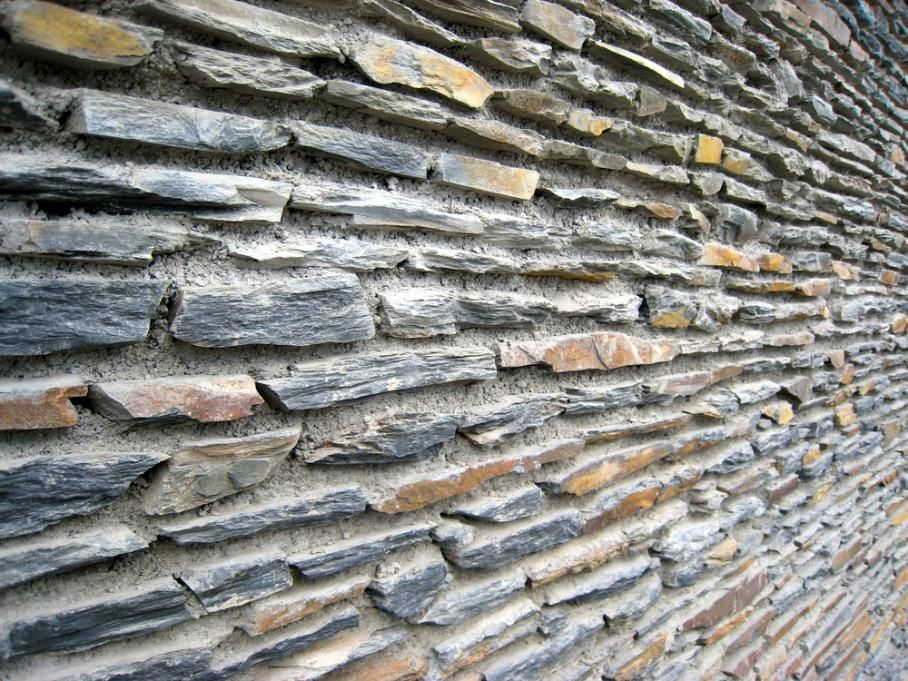 A Stone Wall With A Lot Of Rocks On It — Southern Bricks & Pavers In Narooma, NSW