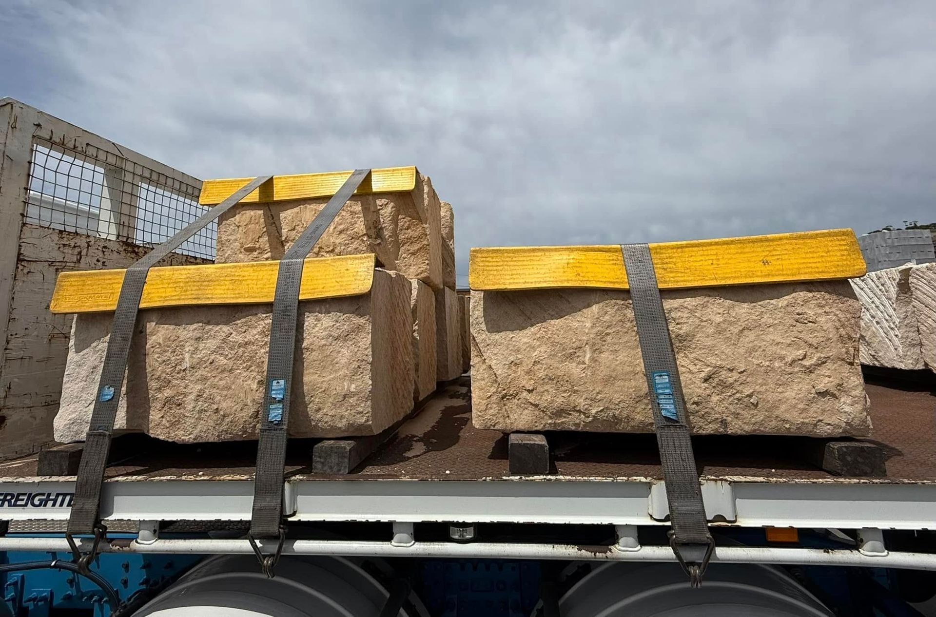A Truck With a Bunch of Boxes on the Back of It — Southern Bricks & Pavers In Ulladulla, NSW