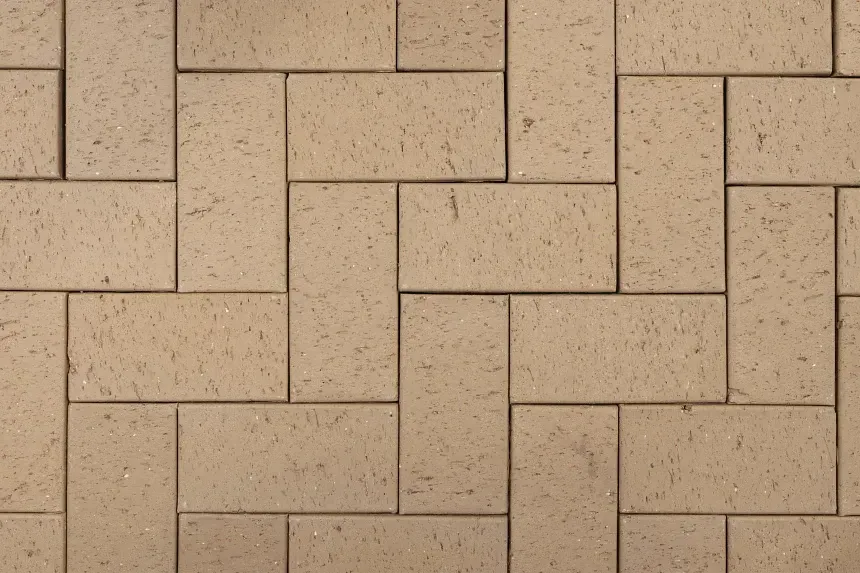 A Close Up of a Brick Wall With a Herringbone Pattern — Southern Bricks & Pavers In Moruya, NSW