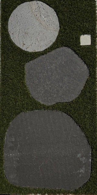 A Stone Walkway In A Garden Surrounded By Grass — Southern Bricks & Pavers In Ulladulla, NSW