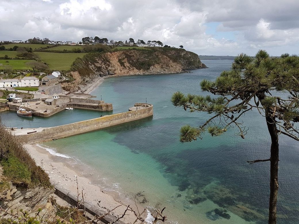 Looking down from a height to the outer harbour and turquoise sea at Charlestown