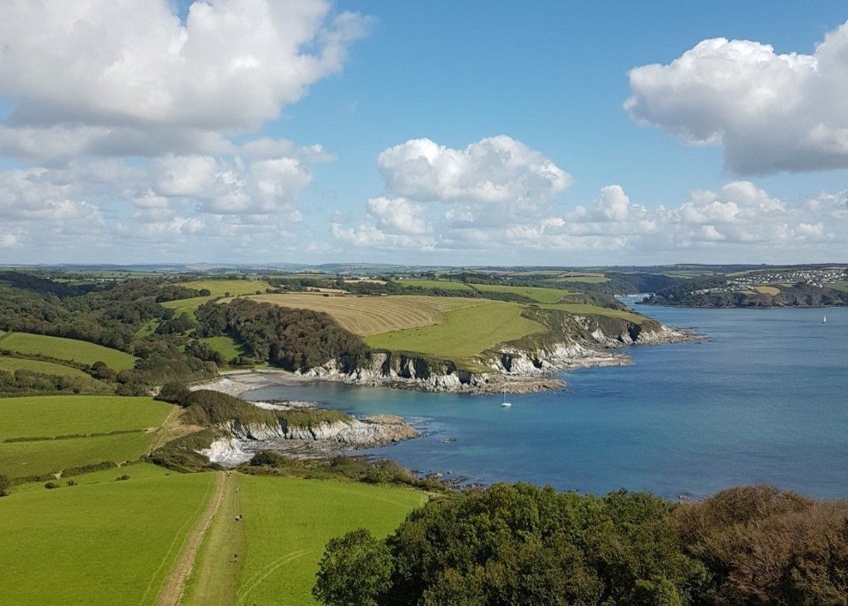 View from the top of the daymark tower at Gribbin Head looking down on Polridmouth Cove