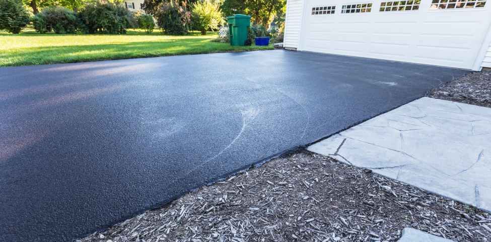 Sealcoating How It Extends the Life of Your Asphalt Driveway