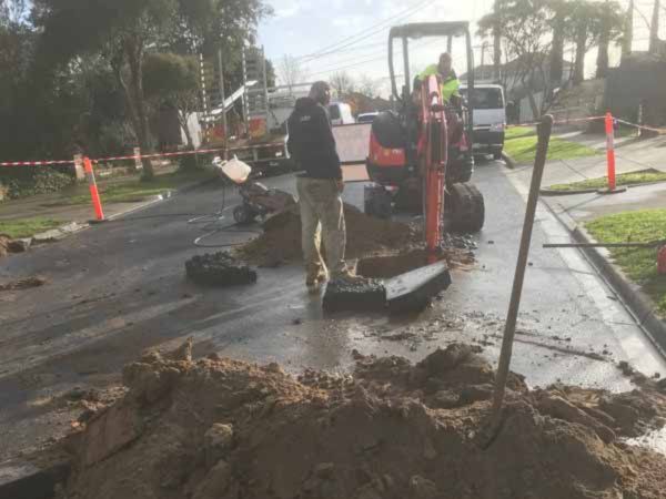 construction workers working on road